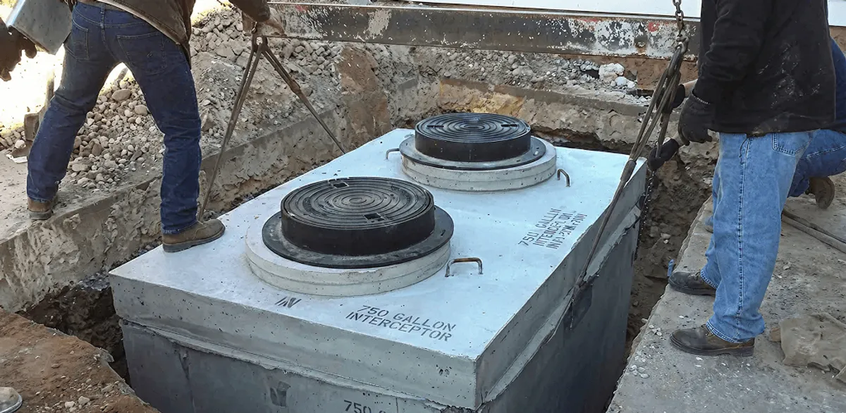 Grease trap installation for a commercial property drainage system in Pittsburgh, PA