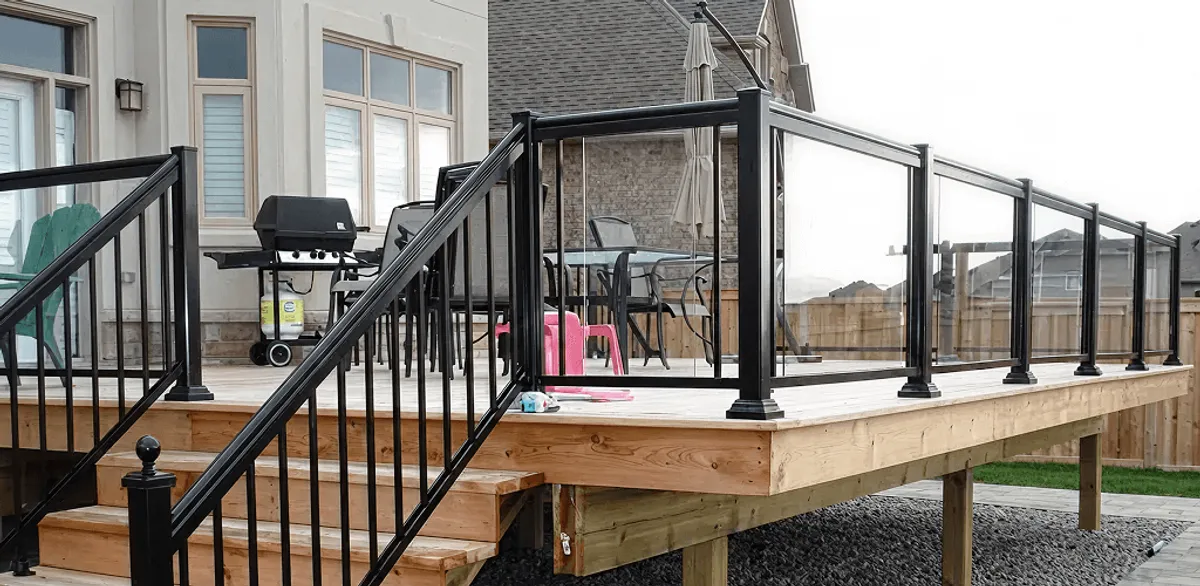 Handrail installation on a deck staircase for safety and code compliance in Pittsburgh, PA