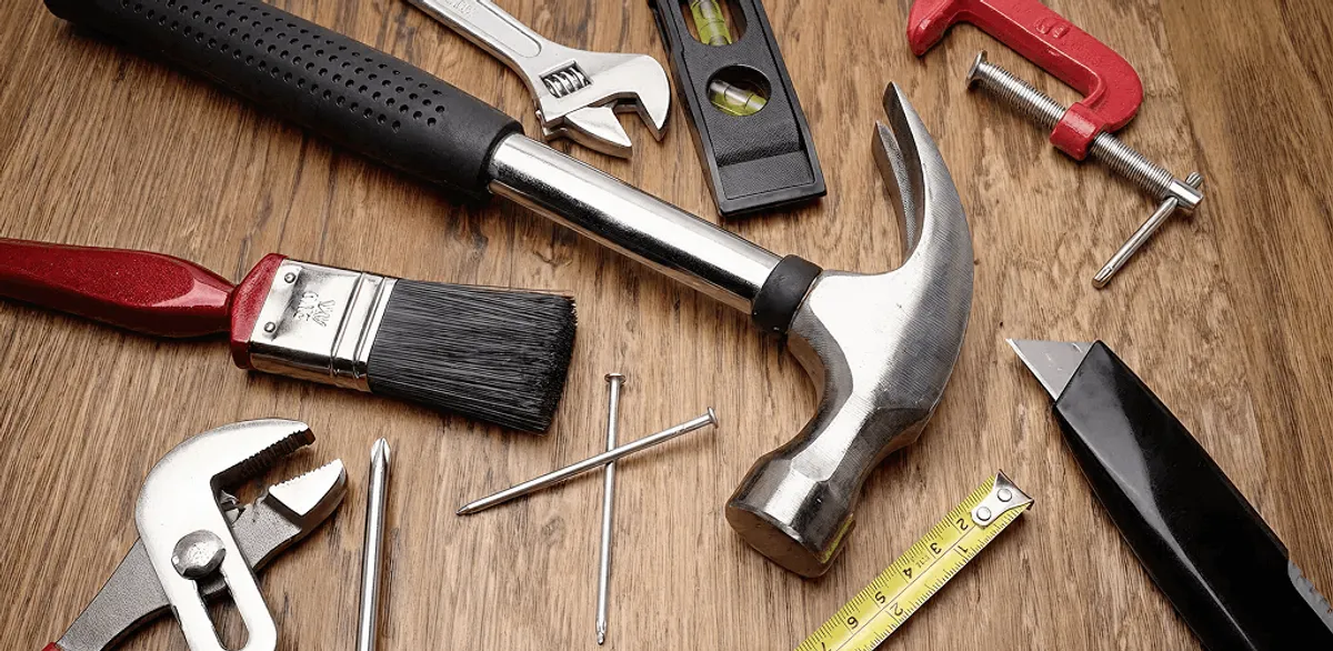 Handyman tools laid out for home repair and maintenance work in Pittsburgh, PA
