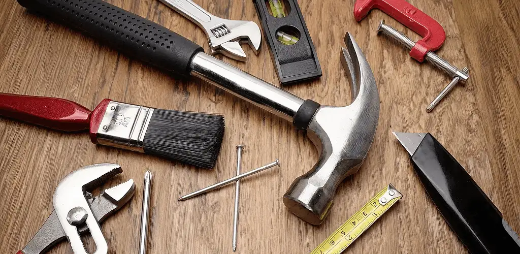 Handyman tools laid out for home repair and maintenance work in Pittsburgh, PA